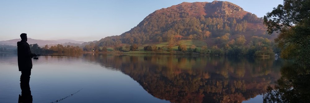 Man fishing by the lake